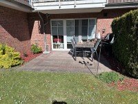 Bild (0502cdcfb944bc9010e20f2c556d6fd2): Vermietete 3-Zimmer-Wohnung mit Blick auf Reetdachhausmitten im alten Dorfkern von Schenefeld